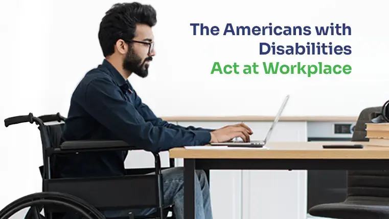 man in a wheelchair typing on his laptop