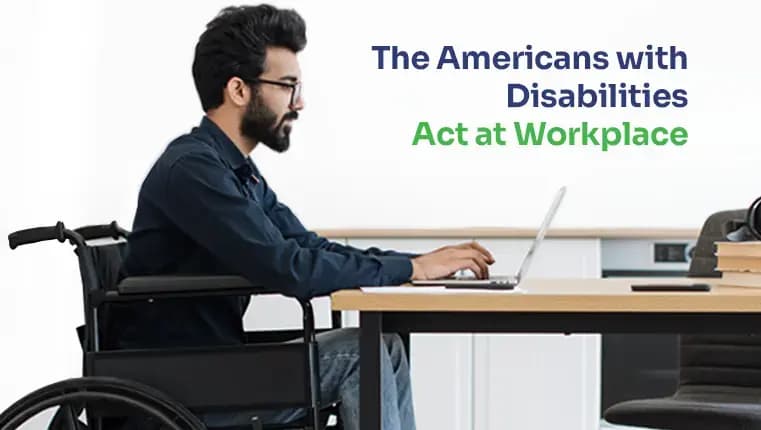 man in a wheelchair typing on his laptop