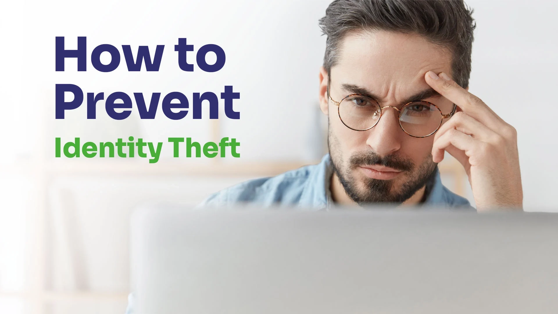 man sitting by his laptop and tries to figure out how to prevent identity theft