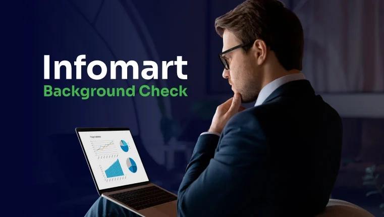 man looking in his laptop on his infomart background check
