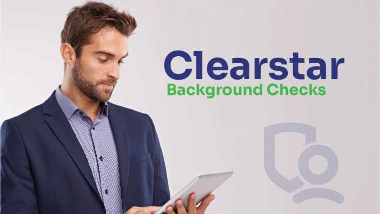 man looking at his clearstar backgorund check in tablet