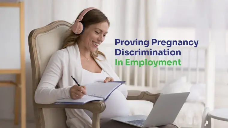 pregnant woman writing down law from her laptop