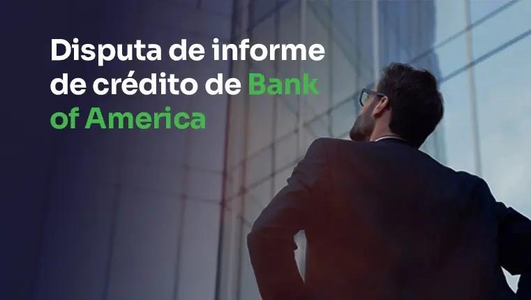 hombre de traje mirando un rascacielos