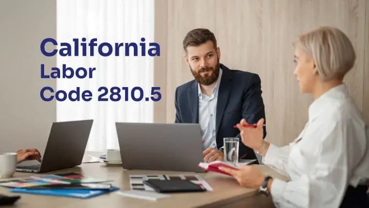 man with beard in classical suit discussing labor code with his colleague