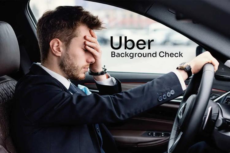 A sad man sitting in a car