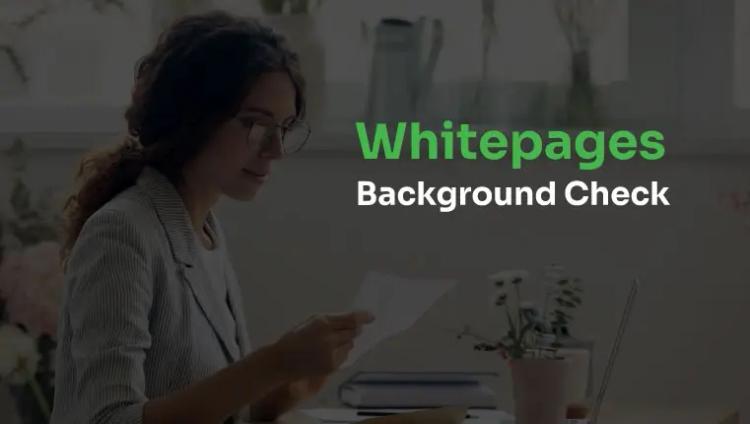 woman in glasses looking at her background check print