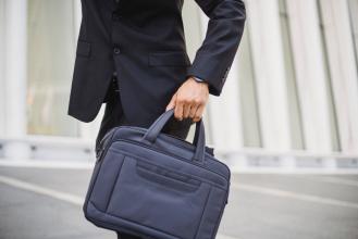 A man with a briefcase.