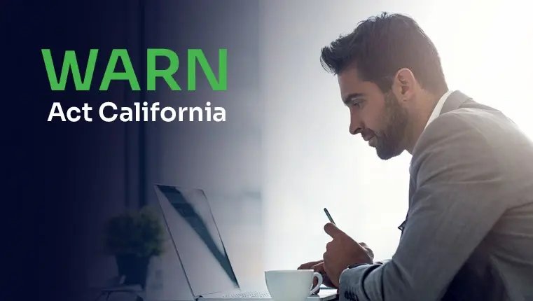 warn act california man in a suit looking at his monoblock pc