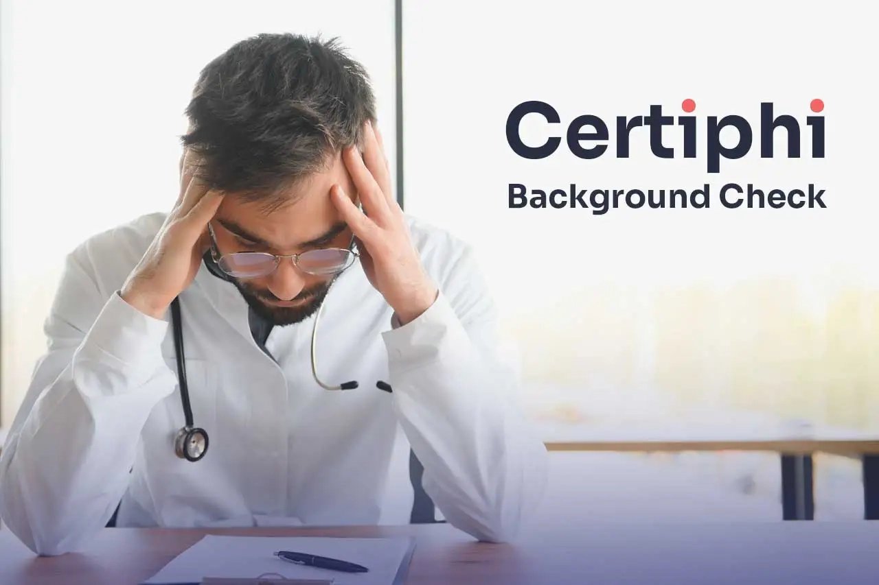 Certiphi Background Check Errors A sad man sits at his desk after receiving a background check response
