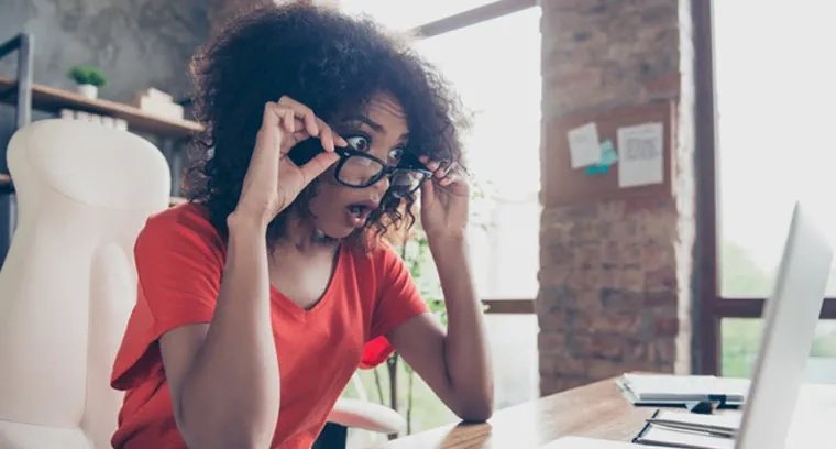 The picture shows a black girl who is surprised by her report expunged record job application