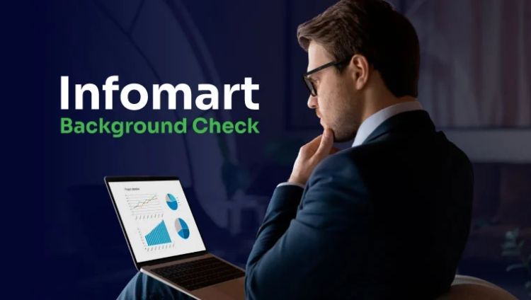 man looking in his laptop on his infomart background check