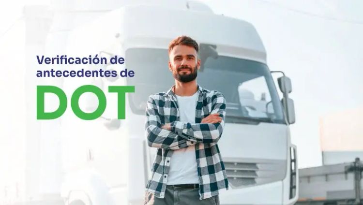 camionero parado frente a su camión