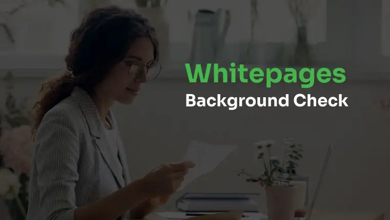 woman in glasses looking at her background check print